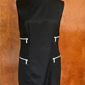 Michael Kors size 4 black dress. Zippered pockets. Nice fit, 80%cotton 20 nylon